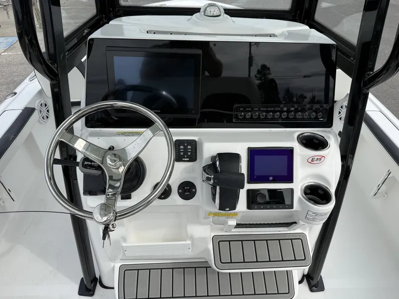 Slide: The Image of Interior view of 2026 Tidewater 2300 Carolina Bay boat cockpit. - 11