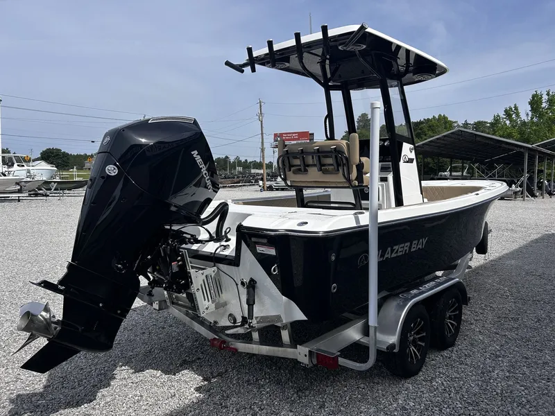 Slide: The Image of 2026 Blazer Bay 2440 boat with Mercury outboard motor. - 8