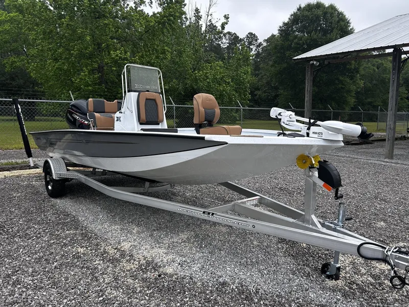 The Image of 2026 Xpress H20B Bay boat parked on trailer outdoors. - 1