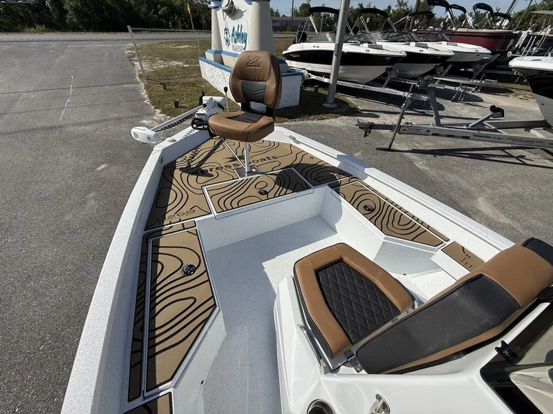 Slide: The Image of 2026 Xpress Hyper-Lift Bay Series H20B boat with stylish design. - 7