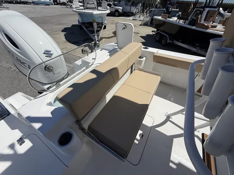 Slide: The Image of 2026 Sea Pro 222 Center Console with Suzuki engine, beige seating. - 13
