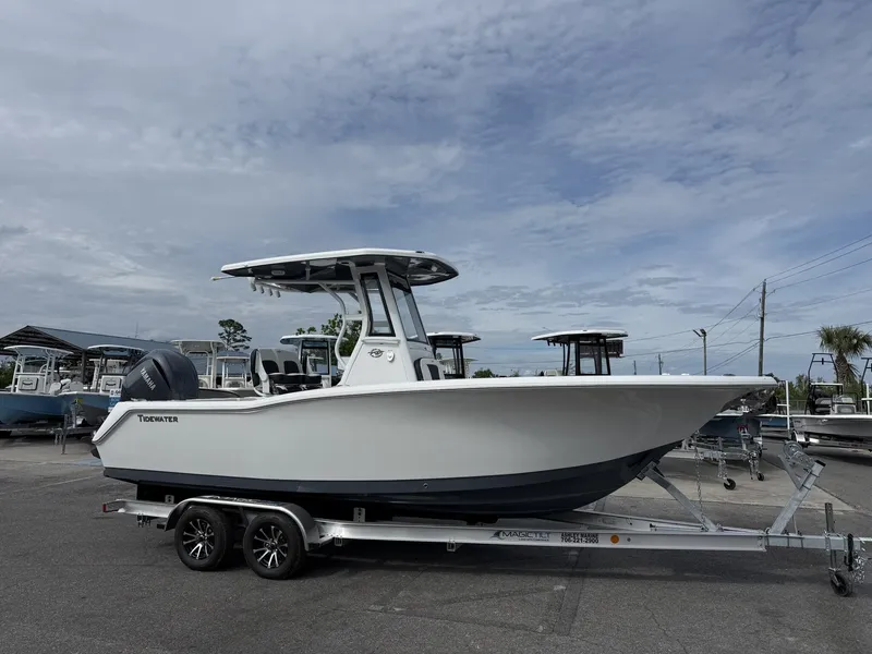 The Image of 2026 Tidewater 232 CC Adventure boat on trailer, side view. - 1