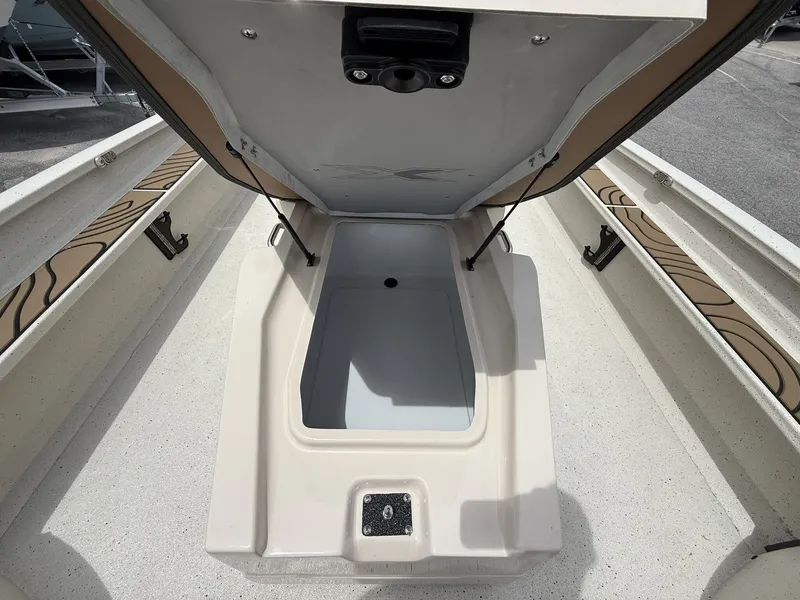 Slide: The Image of Storage compartment in Xpress X23B Bay Lounge boat, 2026 model. - 12