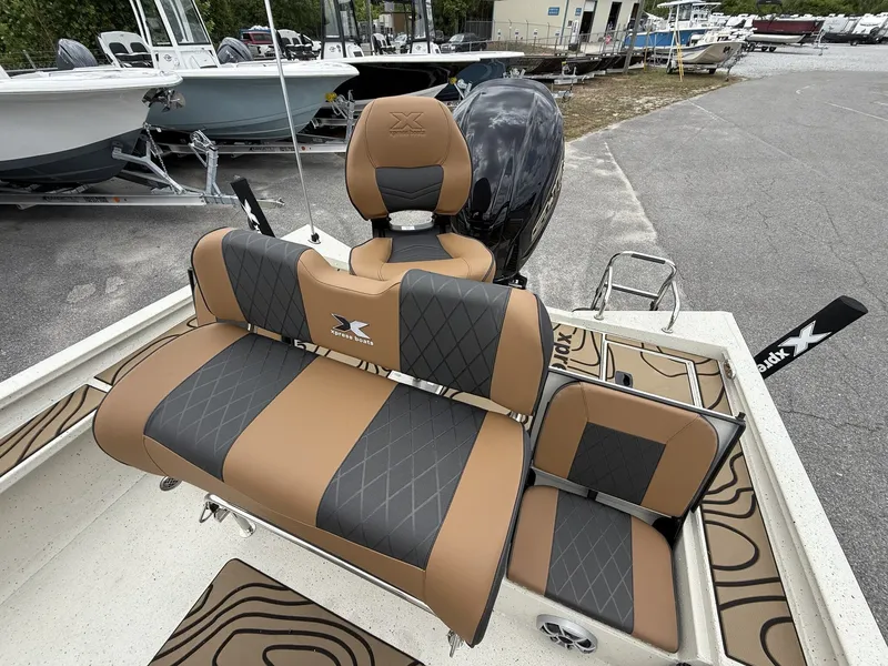 Slide: The Image of 2026 Xpress X23B Bay Lounge boat with luxurious seating. - 15