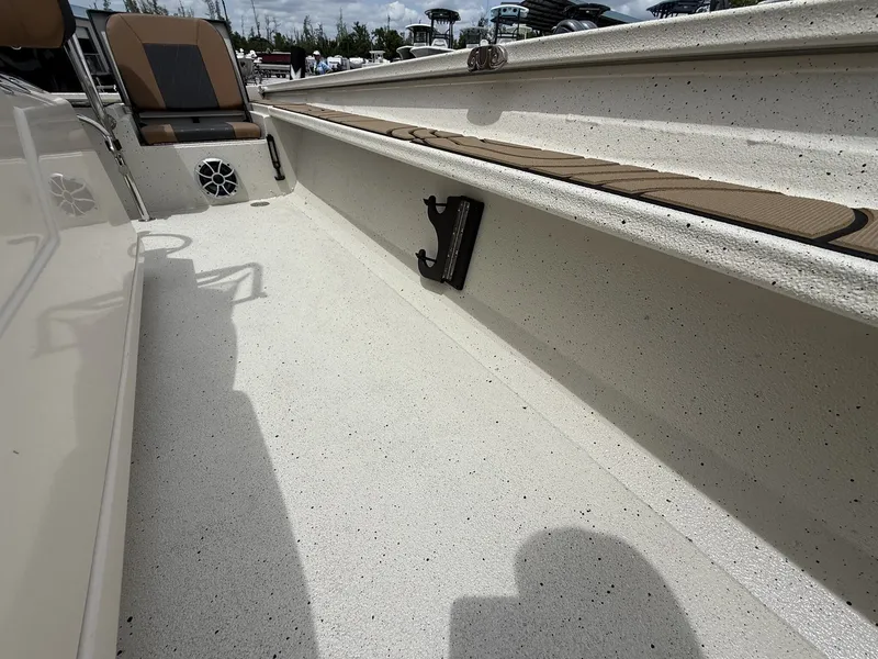 Slide: The Image of Interior of Xpress X23B Bay Lounge boat, model year 2026. - 16