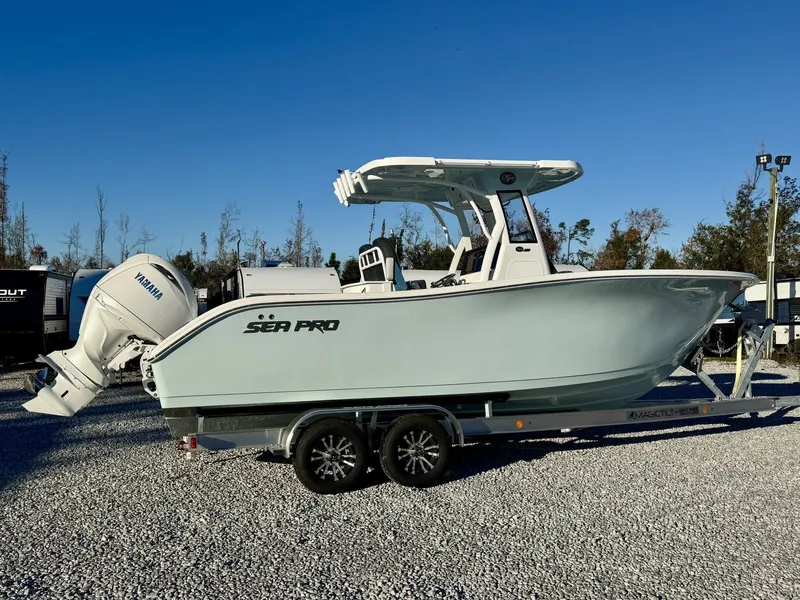 Slide: The Image of 2025 Sea Pro 262 DLX boat on trailer, side view. - 4