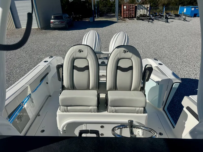 Slide: The Image of Interior view of 2025 Sea Pro 262 DLX with luxurious seating. - 7
