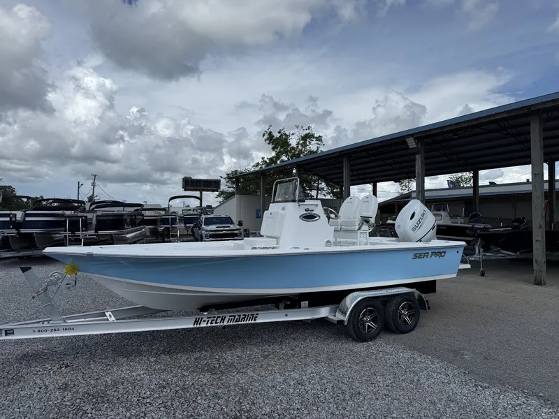 The Image of 2026 Sea Pro 230 Bay boat on trailer outdoors. - 1