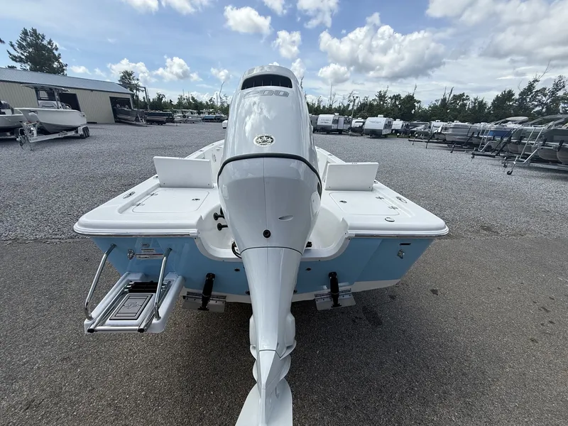 Slide: The Image of Rear view of a 2026 Sea Pro 230 Bay boat in a parking lot. - 4