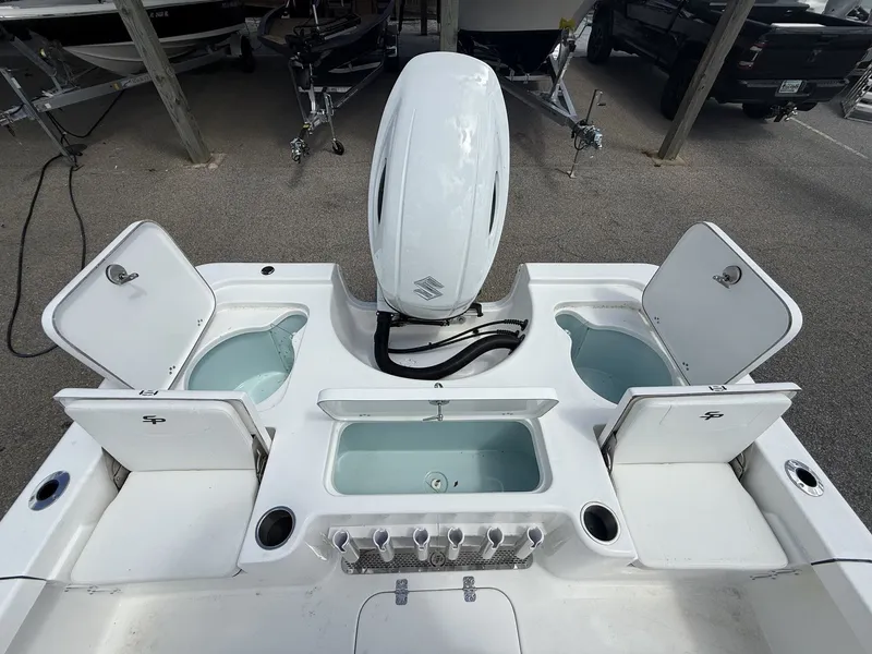 Slide: The Image of Rear view of a 2026 Sea Pro 230 Bay boat with engine. - 5