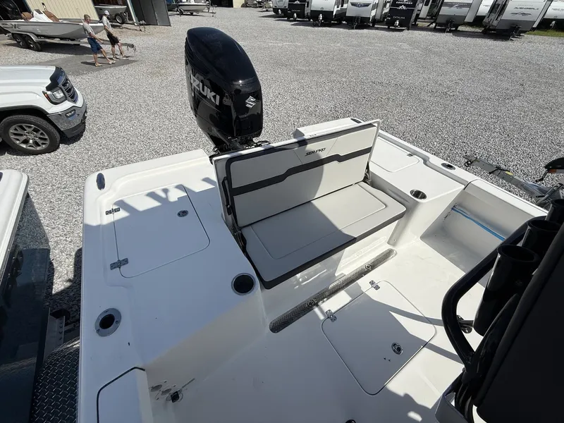 Slide: The Image of 2026 Sea Pro 250 Bay boat with Suzuki engine, rear seat view. - 10