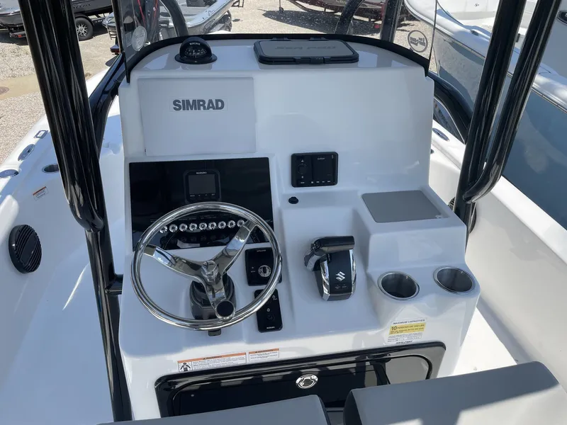 Slide: The Image of Helm console of the 2026 Sea Pro 250 Bay boat. - 14