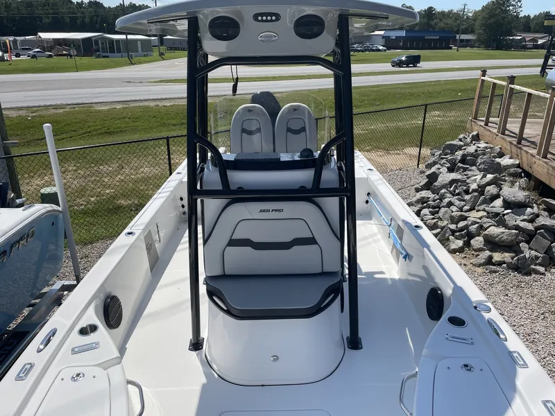 Slide: The Image of 2026 Sea Pro 250 Bay boat on display in a lot. - 17
