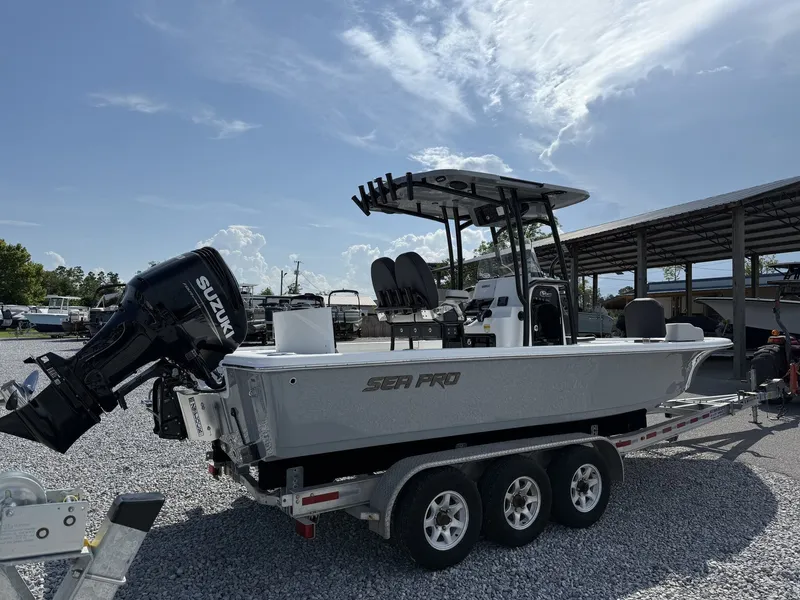 Slide: The Image of 2026 Sea Pro 250 Bay boat on trailer, Suzuki engine. - 3