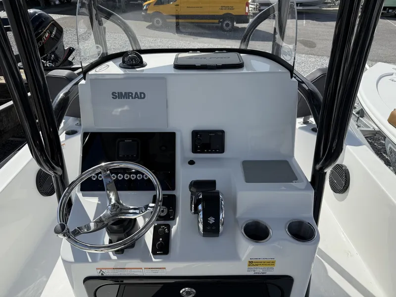 Slide: The Image of Helm console of Sea Pro 250 Bay boat, year 2026. - 4