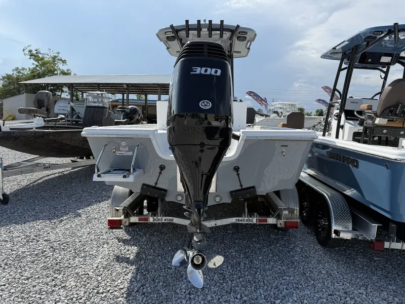 Slide: The Image of Rear view of a 2026 Sea Pro 250 Bay boat with outboard motor. - 8