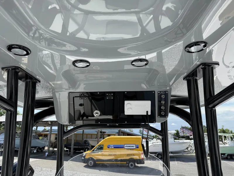 Slide: The Image of Interior view of 2026 Sea Pro 250 Bay with control console. - 9