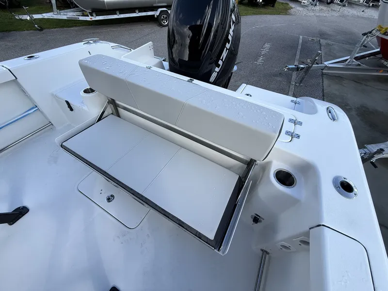 Slide: The Image of Sea Pro 242 boat with foldable seat and Suzuki engine, year 2026. - 15