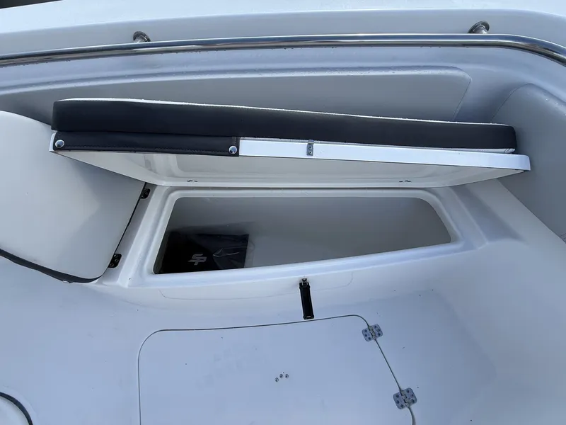 Slide: The Image of Storage compartment in Sea Pro 242 boat with open seat. - 5