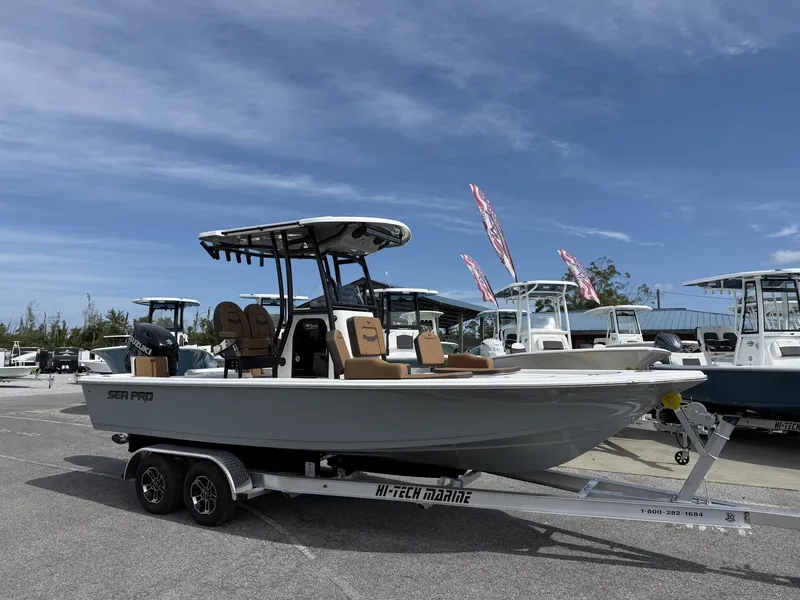 The Image of 2026 Sea Pro 230 Bay boat on trailer outdoors. - 1