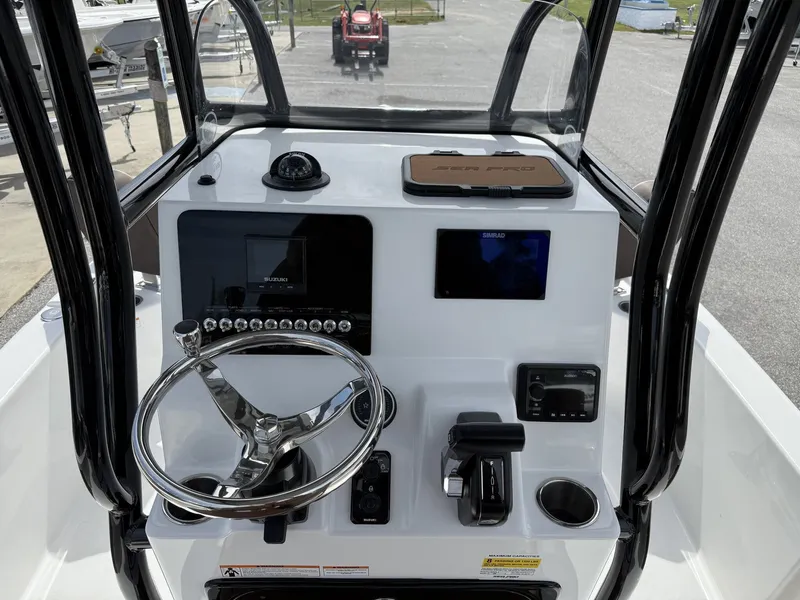Slide: The Image of Helm console of the 2026 Sea Pro 230 Bay boat. - 10