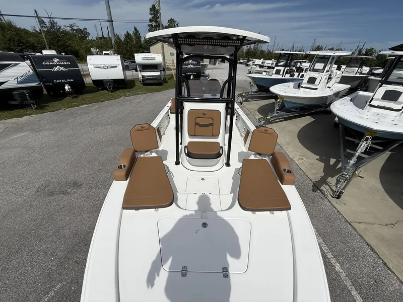 Slide: The Image of 2026 Sea Pro 230 Bay boat parked among other boats. - 5