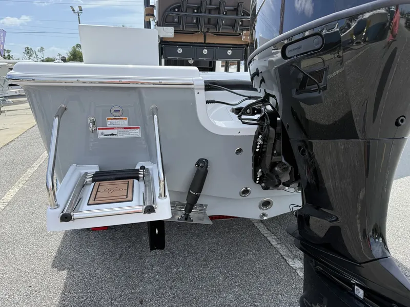 Slide: The Image of Rear view of a 2026 Sea Pro 230 Bay boat. - 7