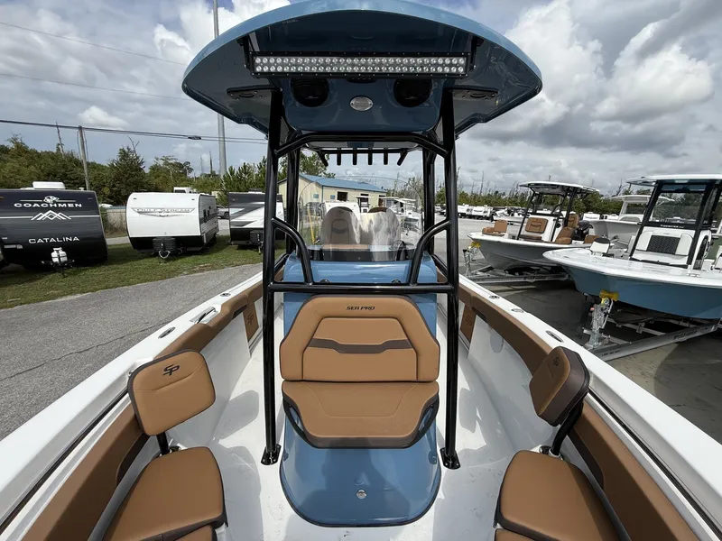 Slide: The Image of 2026 Sea Pro 222 Center Console boat in a parking lot. - 8