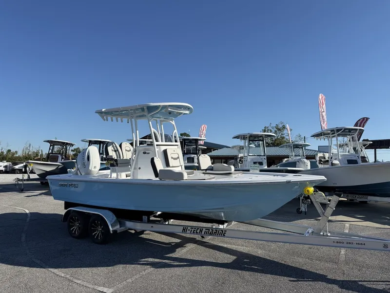 The Image of 2026 Sea Pro 230 Bay boat on trailer outdoors. - 1