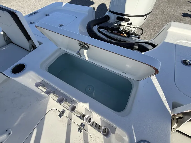 Slide: The Image of 2026 Sea Pro 230 Bay boat with open storage compartment. - 14