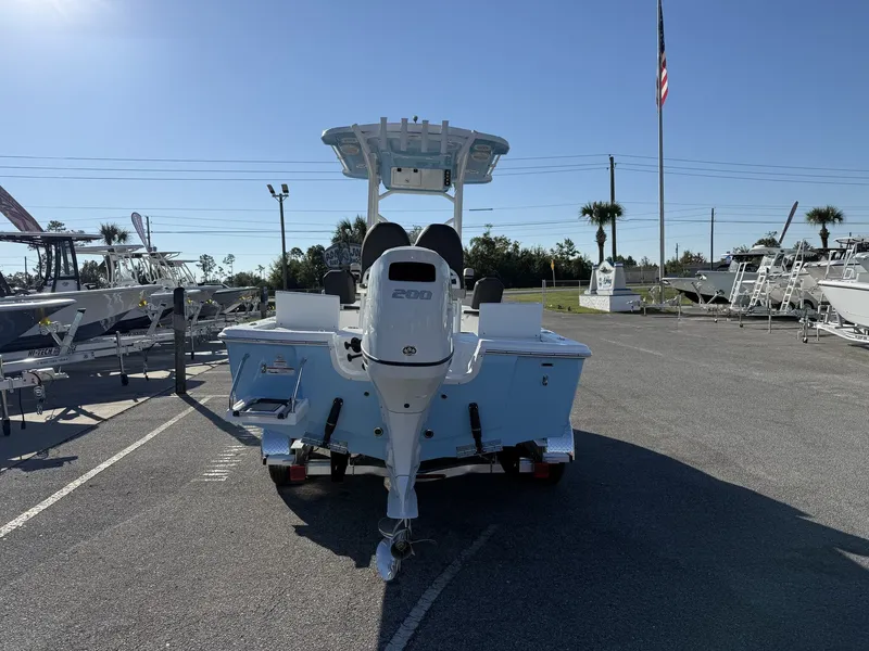 Slide: The Image of Rear view of a 2026 Sea Pro 230 Bay boat in a parking lot. - 4