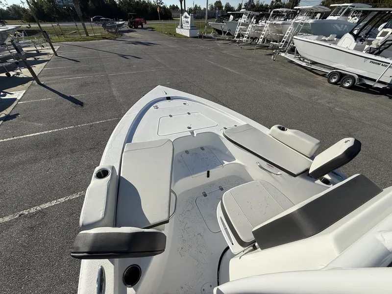 Slide: The Image of 2026 Sea Pro 230 Bay boat on a parking lot. - 9