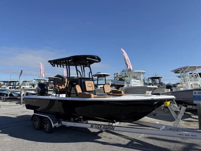 The Image of 2026 Sea Pro 230 Bay boat on trailer outdoors. - 1