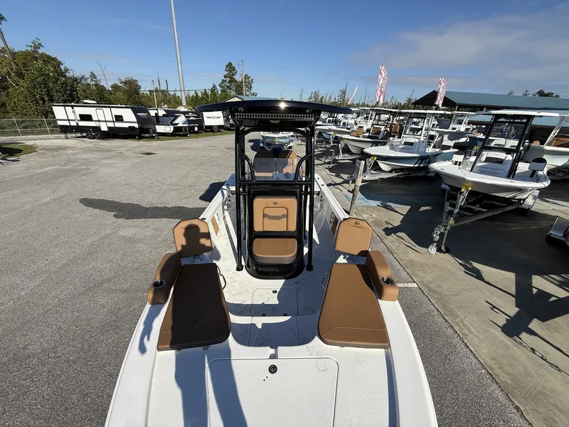Slide: The Image of 2026 Sea Pro 230 Bay boat on a parking lot. - 11