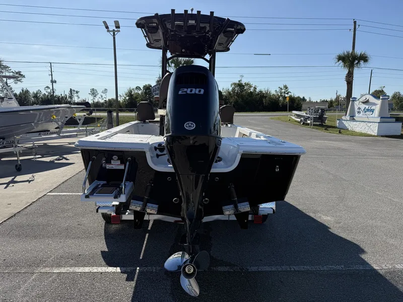 Slide: The Image of Rear view of a 2026 Sea Pro 230 Bay boat outdoors. - 3
