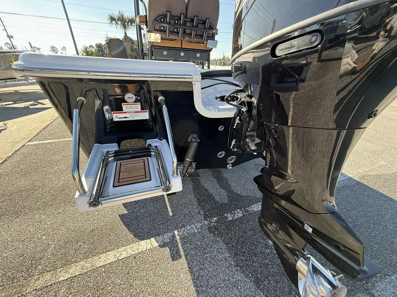 Slide: The Image of Rear view of a 2026 Sea Pro 230 Bay boat. - 4