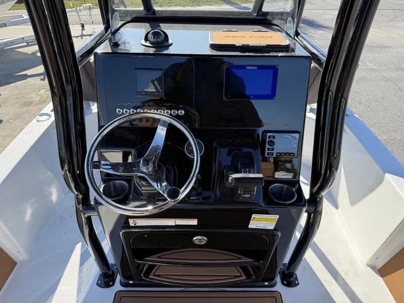 Slide: The Image of Helm console of the 2026 Sea Pro 230 Bay boat. - 7