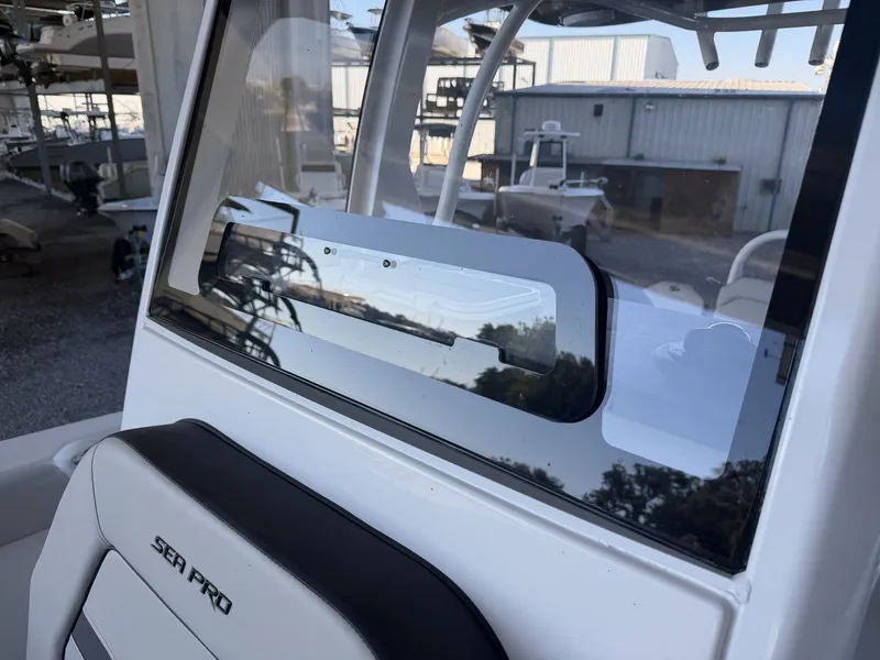 Slide: The Image of Close-up of Sea Pro 245FLX R boat, model year 2026. - 22
