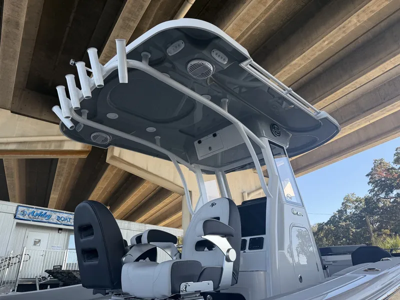 Slide: The Image of 2026 Sea Pro 245FLX R boat under bridge, modern features. - 5