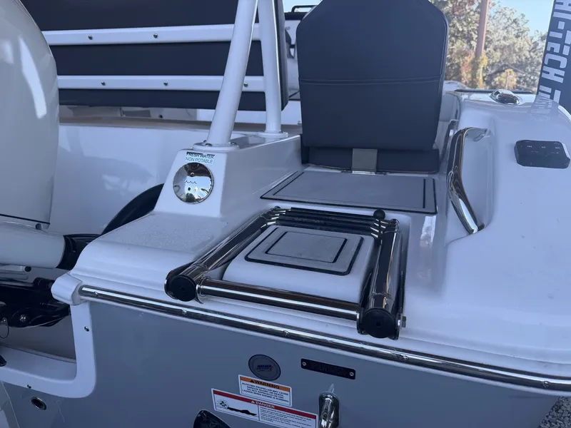 Slide: The Image of 2026 Sea Pro 245FLX R boat with seat and ladder. - 7