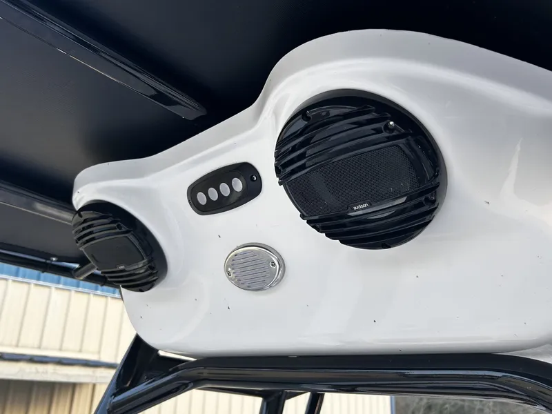 Slide: The Image of Speakers and controls on a 2026 Sea Pro 202 Center Console boat. - 11