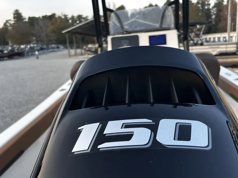Slide: The Image of Close-up of a 2026 Sea Pro 202 Center Console boat engine. - 12