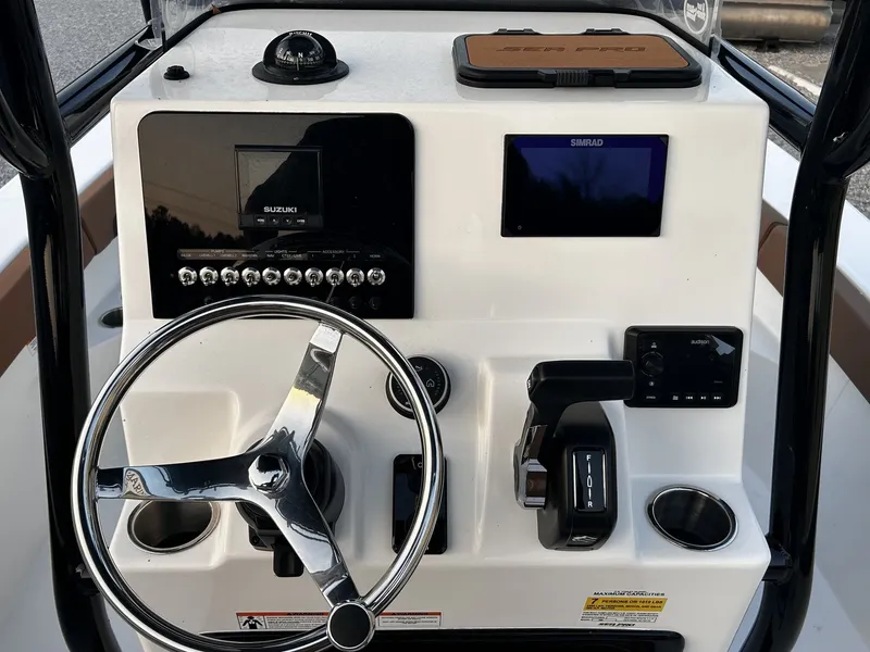 Slide: The Image of Dashboard of Sea Pro 202 Center Console 2026 with steering wheel and instruments. - 3
