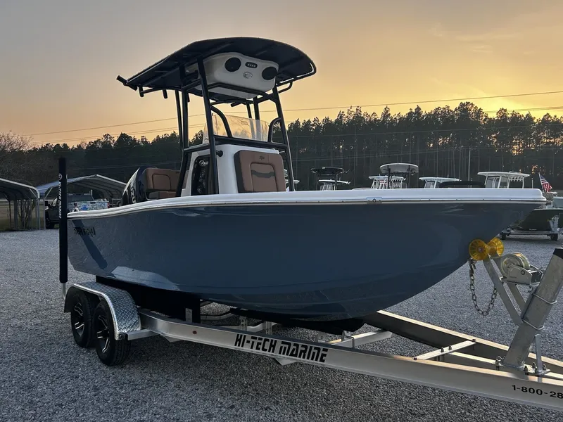 Slide: The Image of 2026 Sea Pro 202 Center Console boat on trailer at sunset. - 7