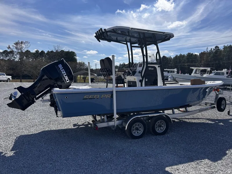 Slide: The Image of 2026 Sea Pro 230 Bay boat with Suzuki engine on trailer. - 10