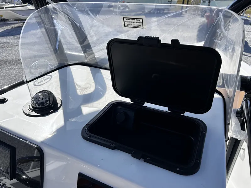 Slide: The Image of 2026 Sea Pro 230 Bay boat console with compass and storage. - 20