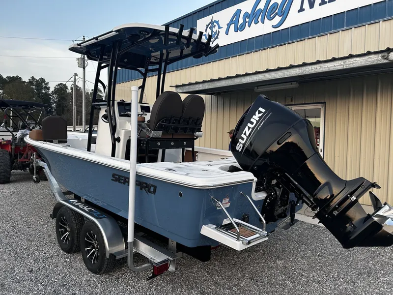 Slide: The Image of 2026 Sea Pro 230 Bay boat with Suzuki engine on trailer. - 3