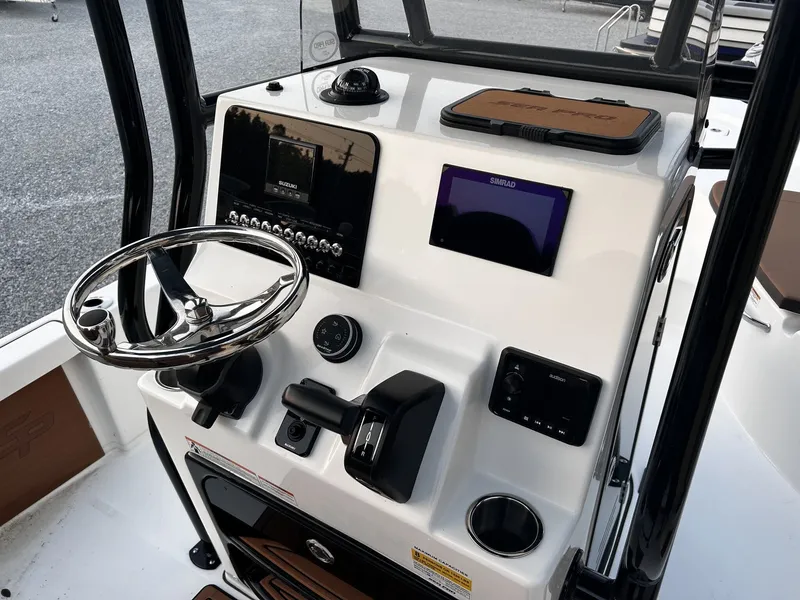 Slide: The Image of Interior view of 2026 Sea Pro 230 Bay helm. - 4