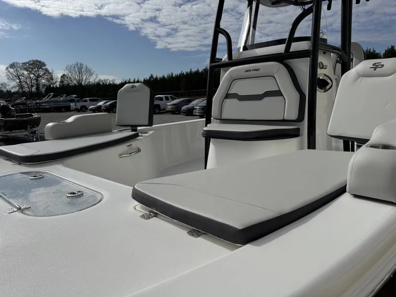 Slide: The Image of 2026 Sea Pro 250 Bay boat with luxurious seating area. - 4