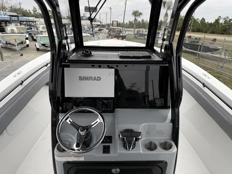 Slide: The Image of Interior view of Sea Pro 292 SEAKEEPER with Simrad controls, 2026 model. - 12